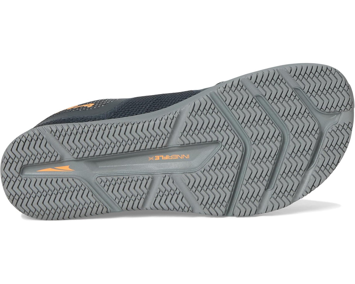 Men's dark gray running shoe outsole with textured geometric tread pattern