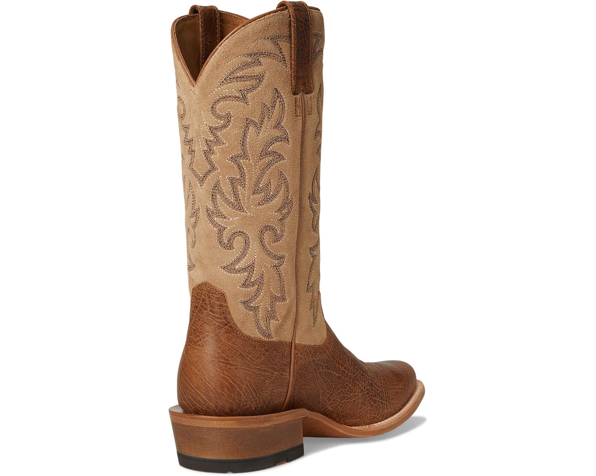 Tan and brown cowboy boots with tall shaft, heel, and floral panel