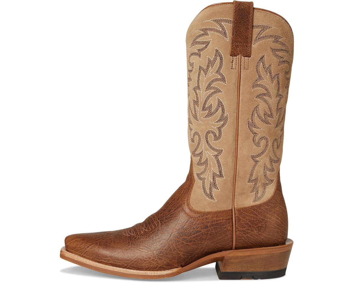 Tan and brown cowboy boots with pull-on strap and floral embroidery