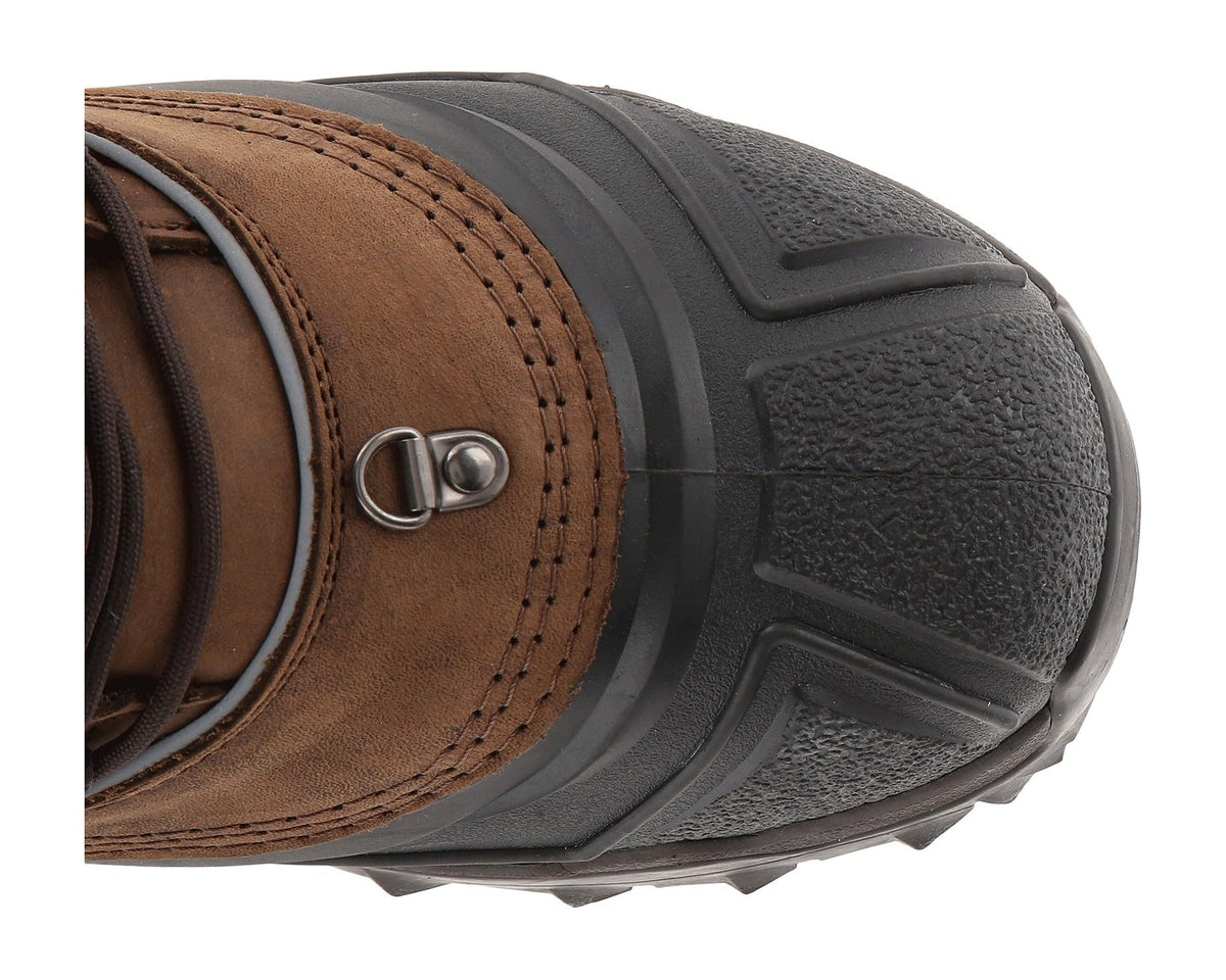 Worn brown leather-and-textile boot toe with gray rubber guard and lace hooks