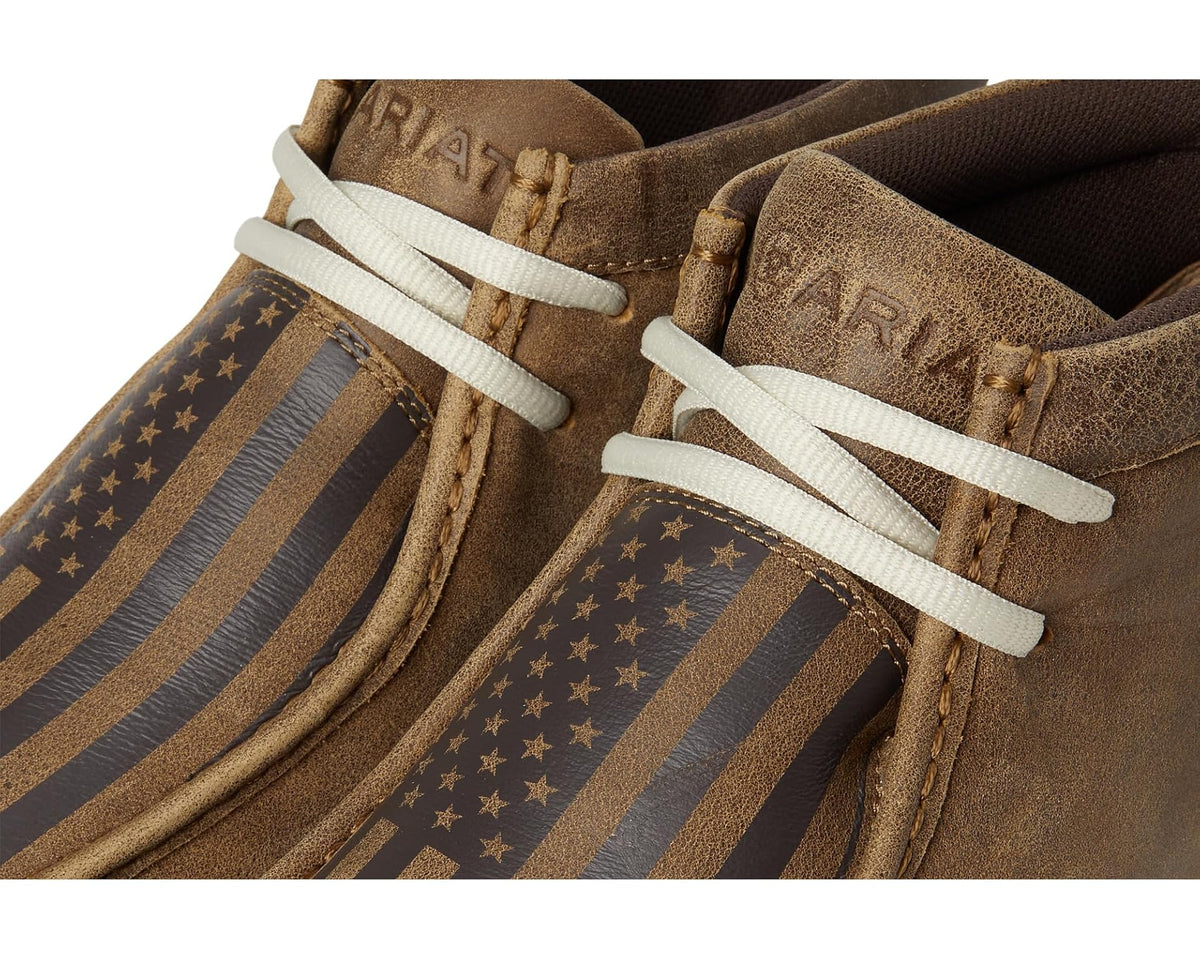 Men's chukka boot close-up with American flag stripes and stars, white lace-up