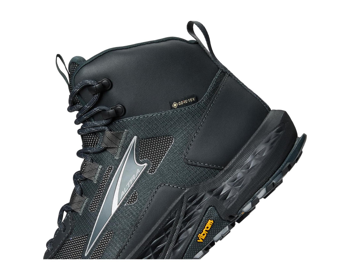 Black boot side with lace hardware and “GORE-TEX” logo label