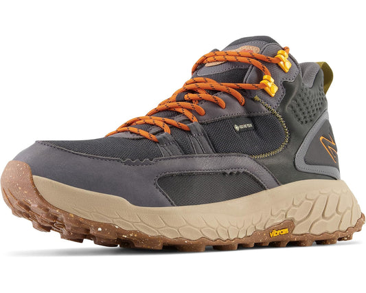 New Balance men's mid-top waterproof trail sneaker, dark gray/black, orange laces