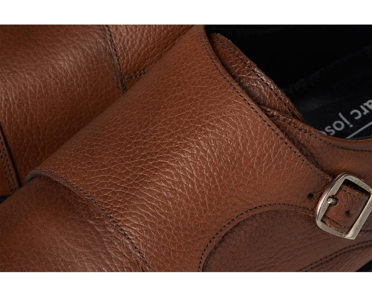 Cognac leather monk strap shoe upper detail with stitching and buckle
