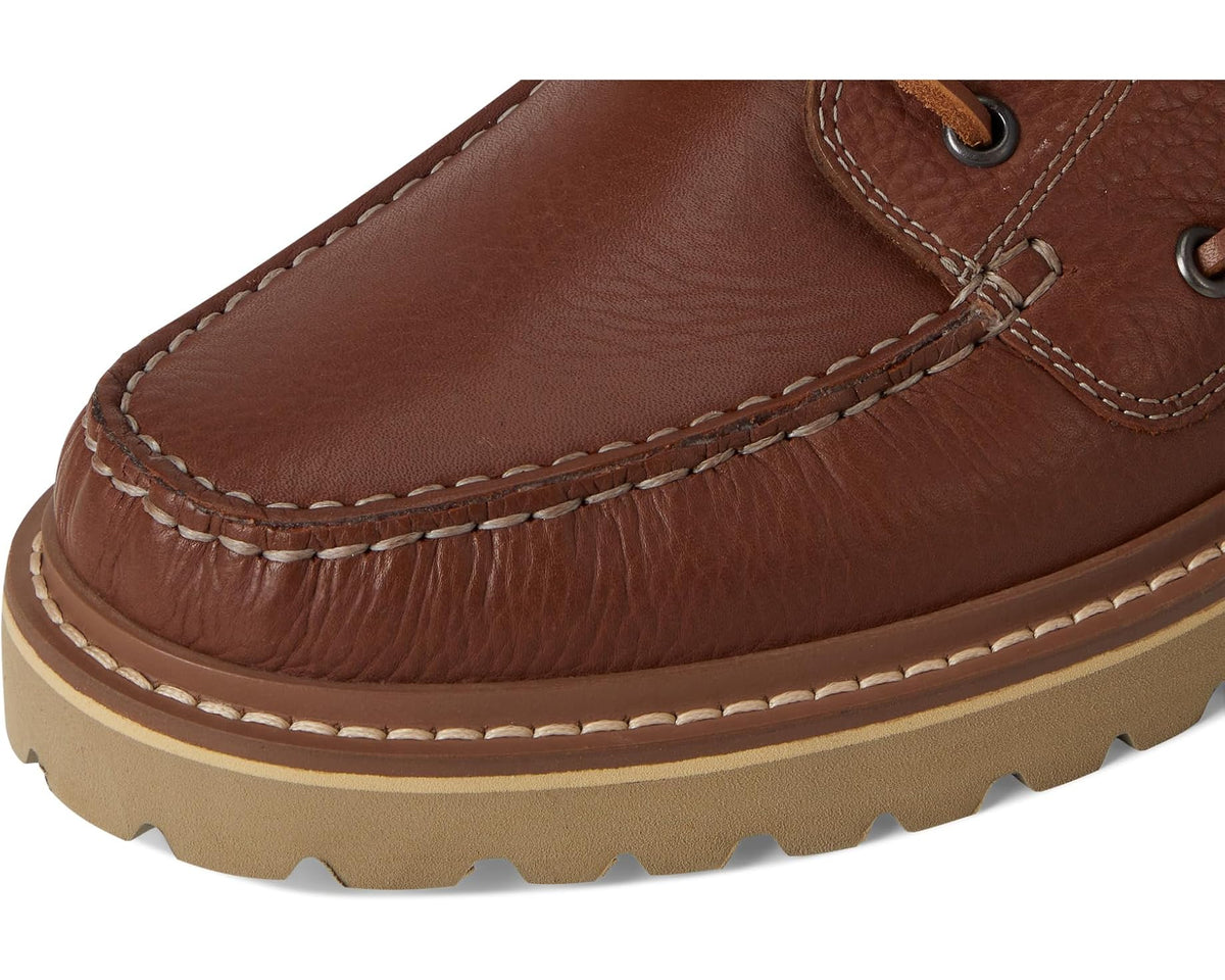 Hazelnut leather boat shoe toe with contrast stitching and rubber edge
