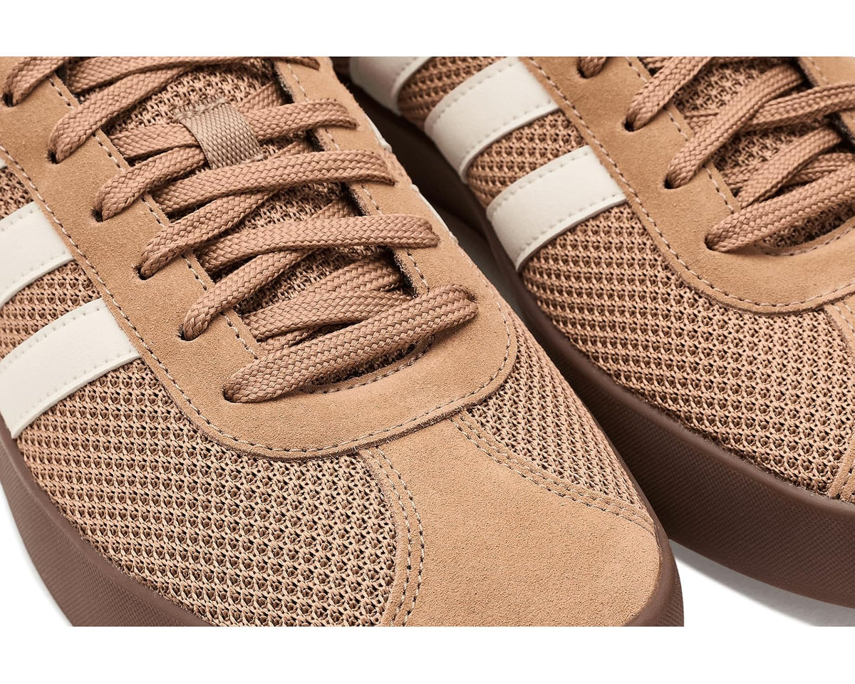 Close-up of men's adidas VL Court 3.0 lace-up sneakers with mesh and suede panels
