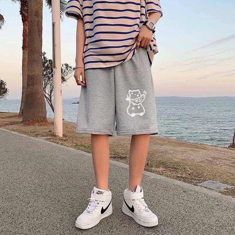 Light gray straight sports shorts with white cat face graphic on the front leg.