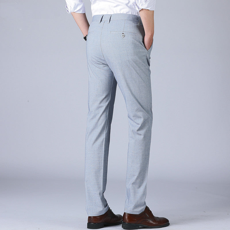 Light blue men's slim-fit thin pants with belt loops and straight legs
