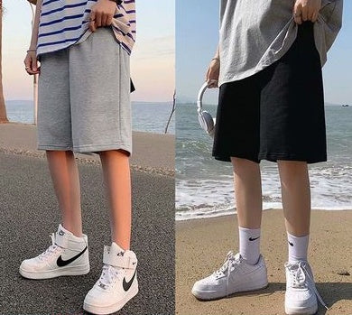 Straight sports shorts shown in light gray and black (side-by-side)